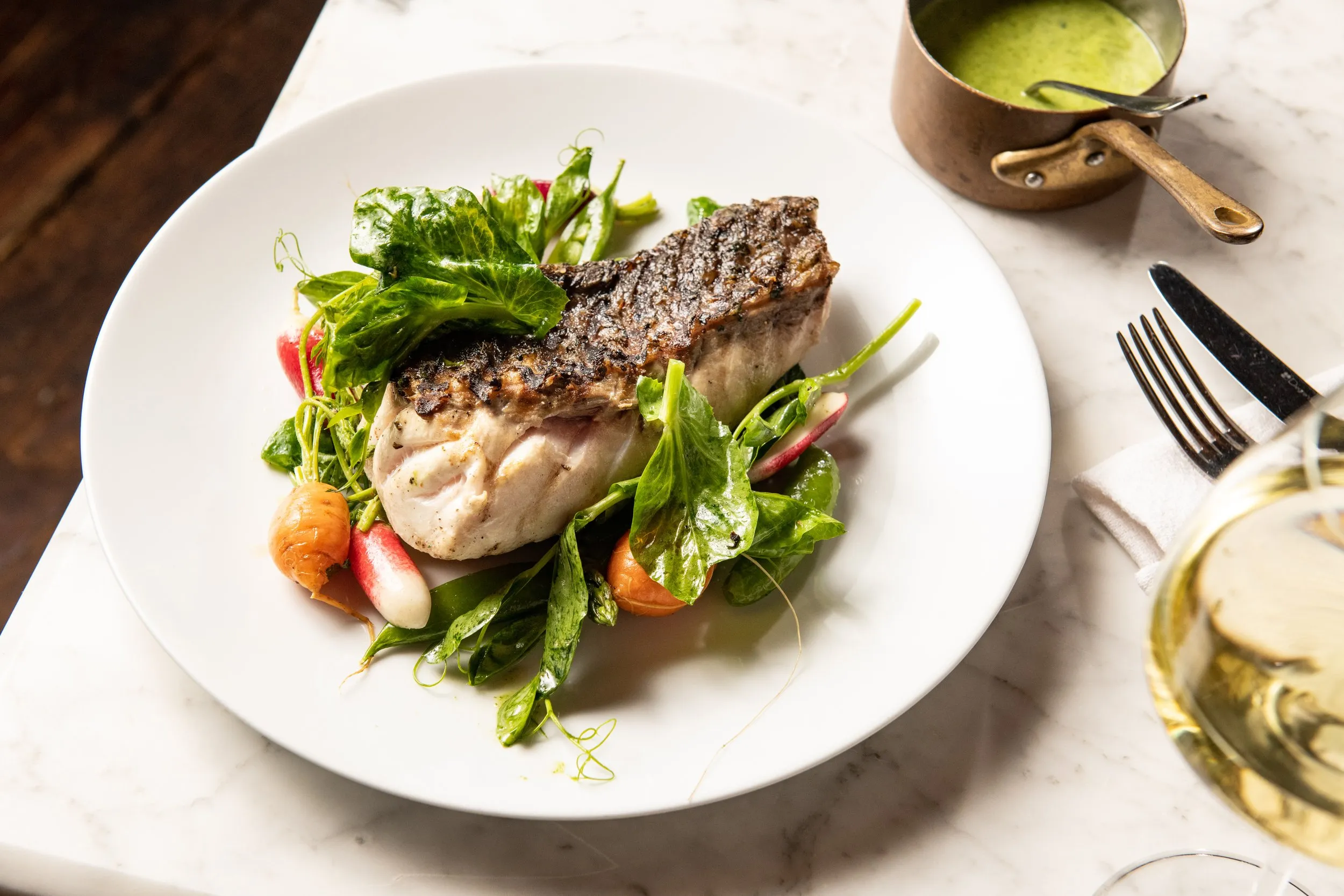 Market fish with scallion soubise