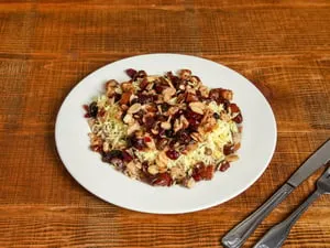 Lentil Rice Topped With Almond, Date, Cranberry And Raisons