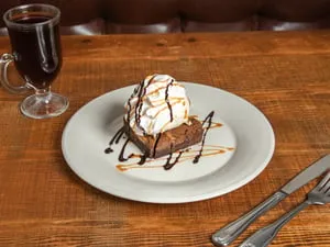 Brownie Topped with Vanilla Ice Cream