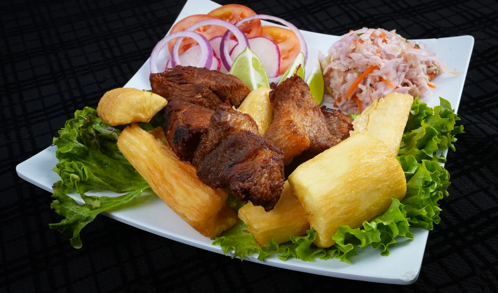 SALVADOREAN YUCA CON CHICHARRON