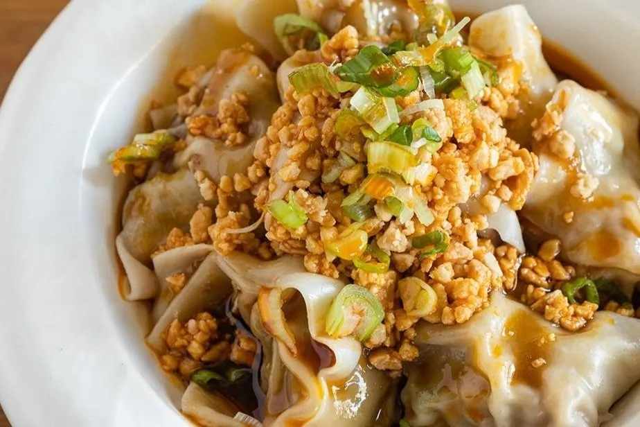 Chicken Wontons in Spicy Sauce