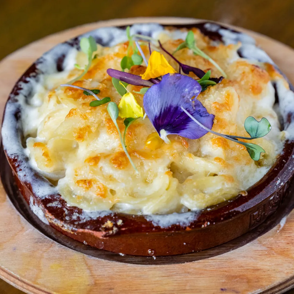 Mac & manchego cheese, truffle oil