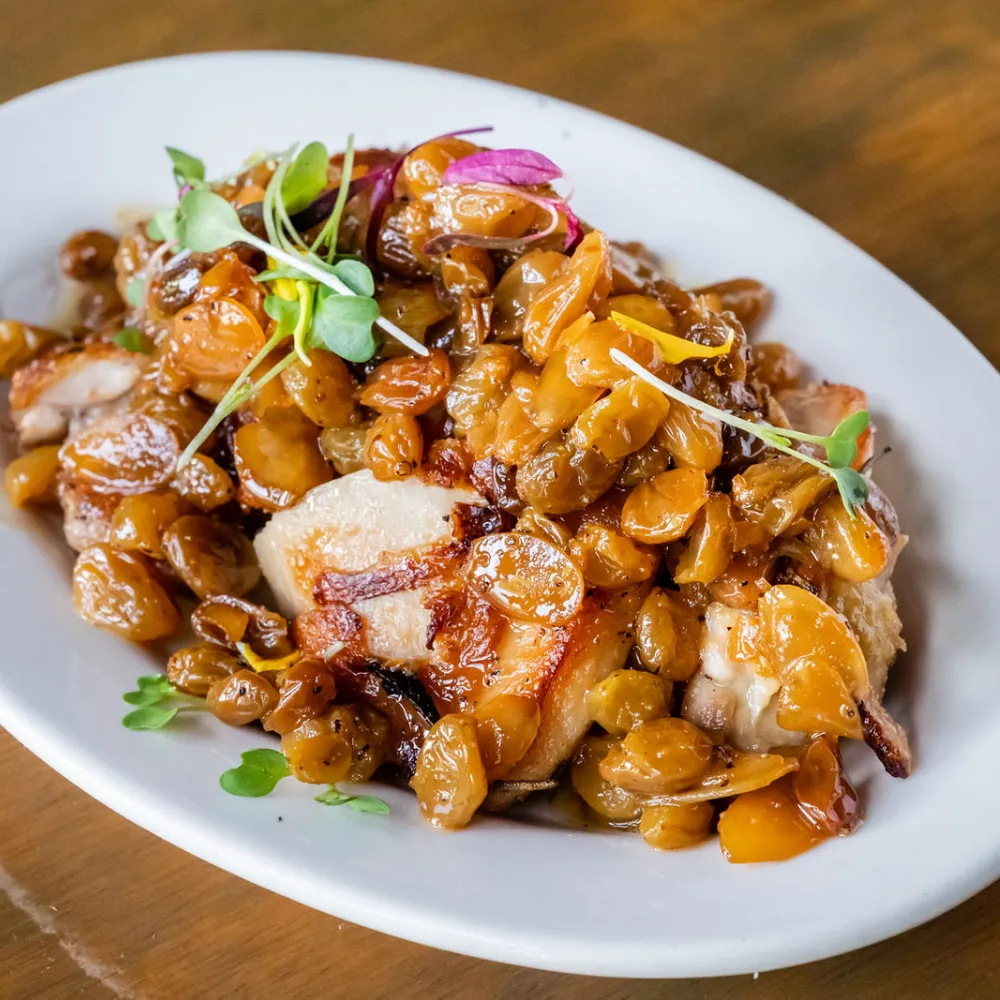 Catalan chicken, chablis raisins and shaved almonds