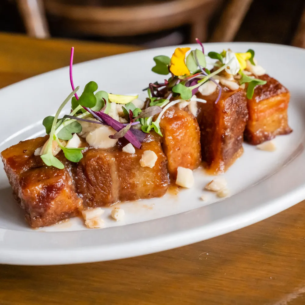 Membrillo glazed pork belly, marcona almonds
